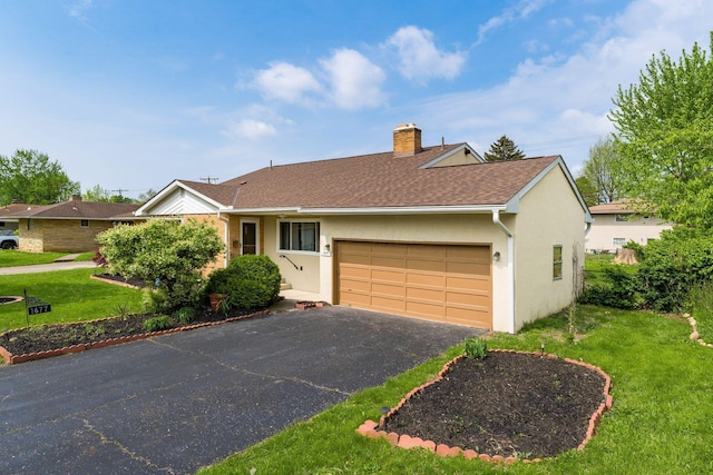 1677 Kenview Rd, Columbus, OH 43209 - ranch-style home with stucco siding, an attached garage, driveway, and a front lawn