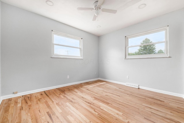 1677 Kenview Rd, Columbus, OH 43209 - empty room featuring a healthy amount of sunlight, baseboards, and visible vents