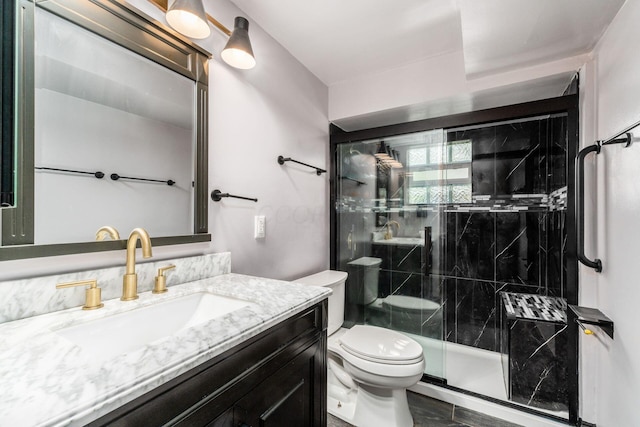 1677 Kenview Rd, Columbus, OH 43209 - bathroom featuring vanity, toilet, and a stall shower