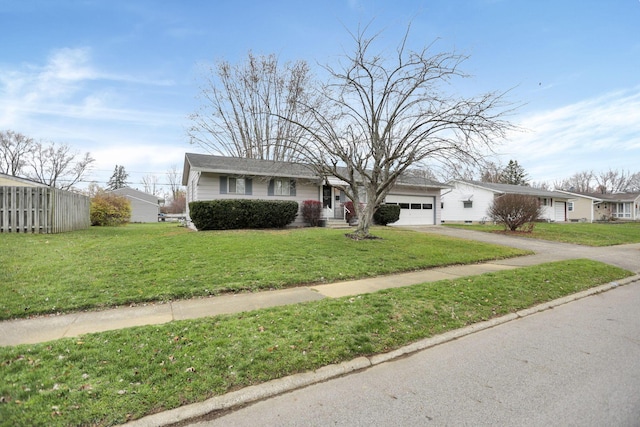 single story home with a garage and a front lawn