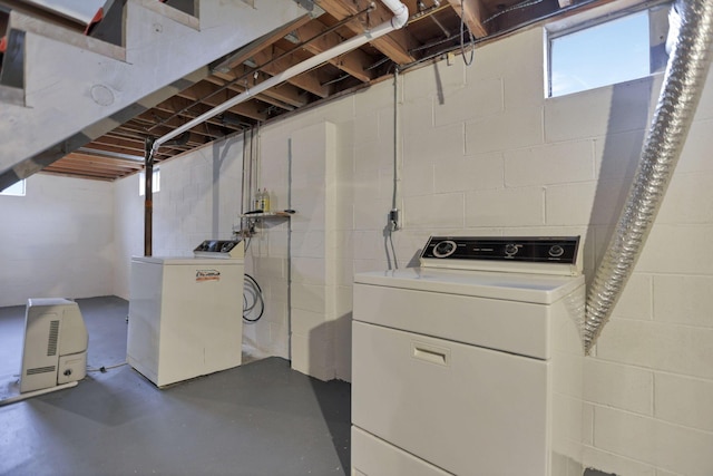 washroom with separate washer and dryer