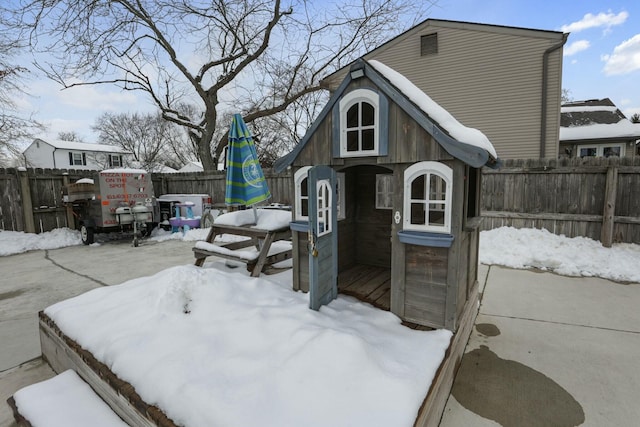 view of snow covered deck