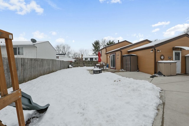 view of yard covered in snow