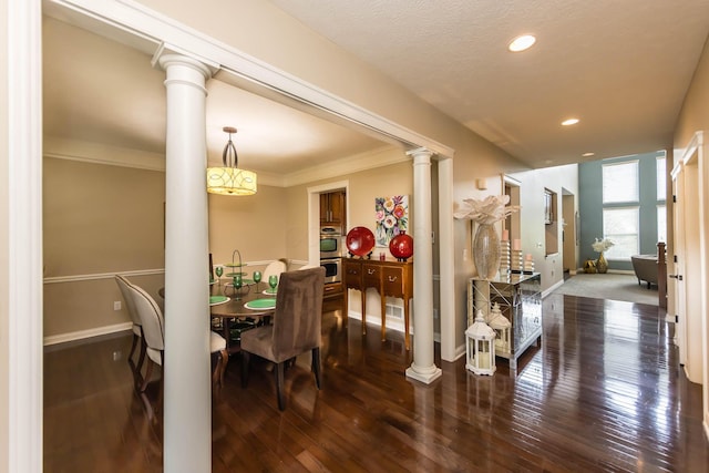 7201 Dean Farm Rd, New Albany, OH 43054 - dining space with decorative columns, wood-type flooring, baseboards, crown molding, and recessed lighting
