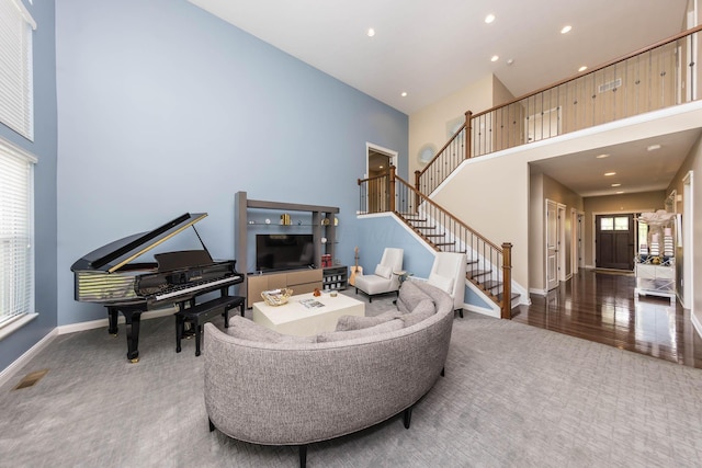 7201 Dean Farm Rd, New Albany, OH 43054 - living room featuring carpet, a high ceiling, stairway, baseboards, and recessed lighting