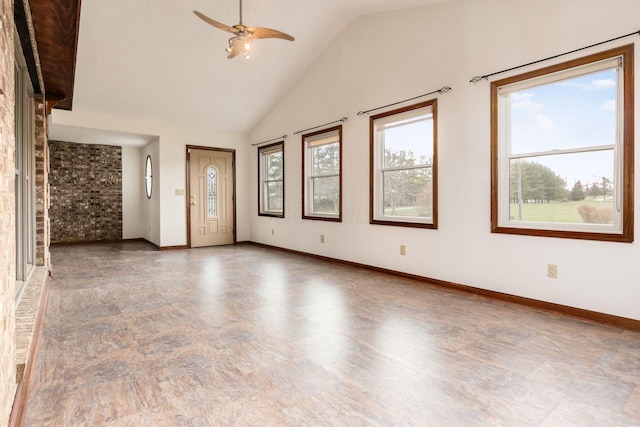 interior space with ceiling fan and high vaulted ceiling