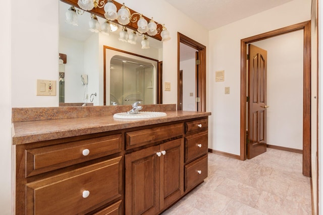 bathroom with vanity and walk in shower