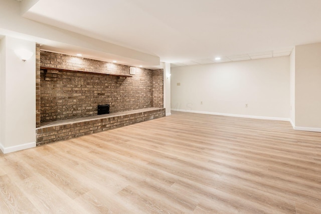 unfurnished living room with light hardwood / wood-style flooring