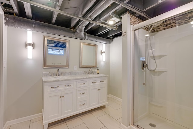 bathroom featuring vanity and a shower with door