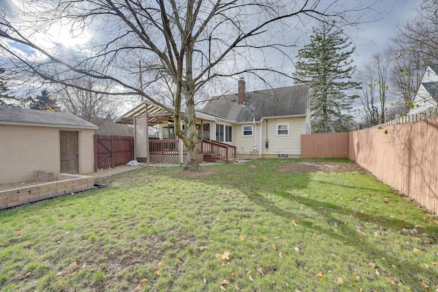 view of yard with a deck