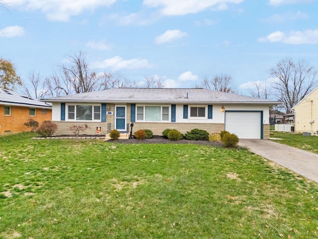 single story home featuring a front yard and a garage