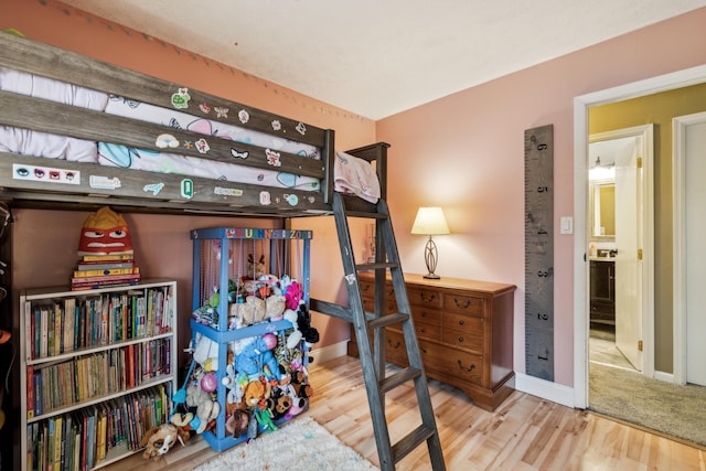 bedroom featuring wood-type flooring