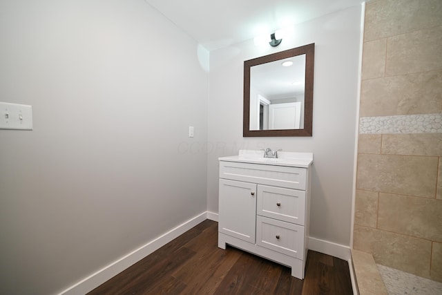 bathroom featuring vanity and wood-type flooring