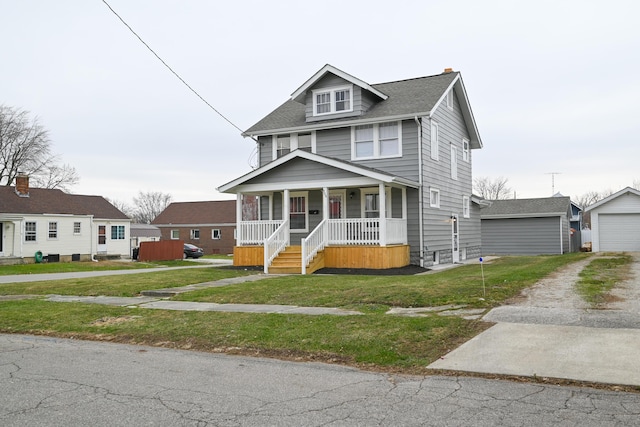 view of front of property featuring covered porch and a front yard