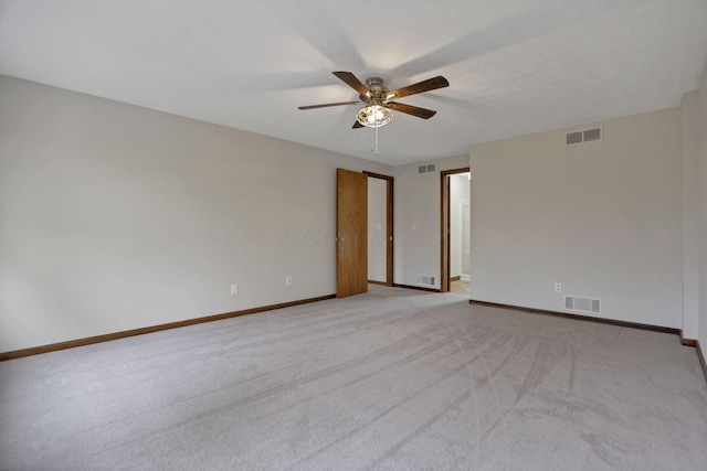 carpeted empty room with ceiling fan