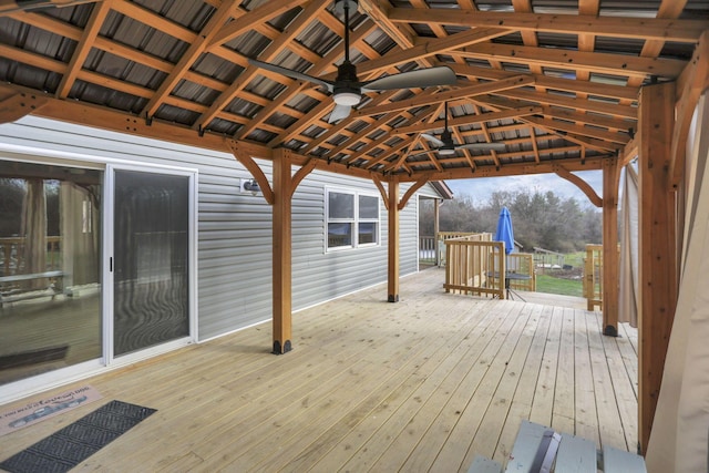 deck featuring a gazebo and ceiling fan