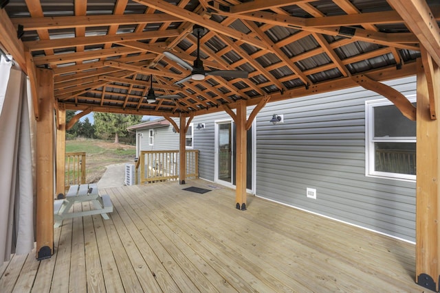 deck with a gazebo and ceiling fan