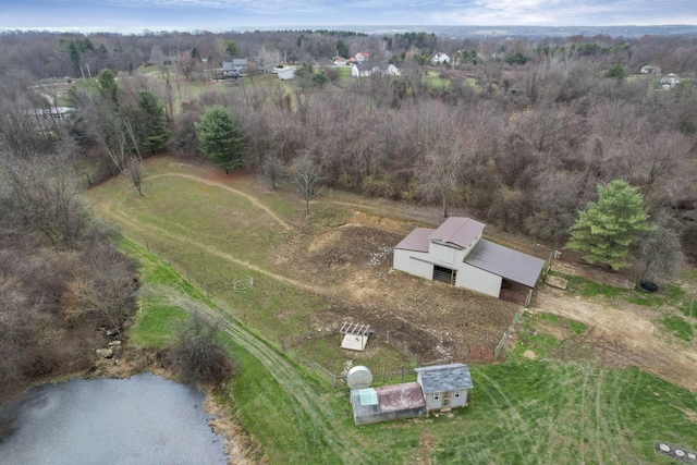 birds eye view of property with a rural view