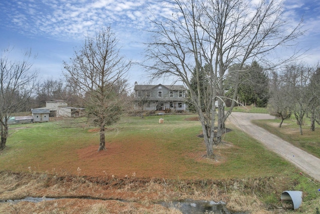 view of front of house with a front lawn