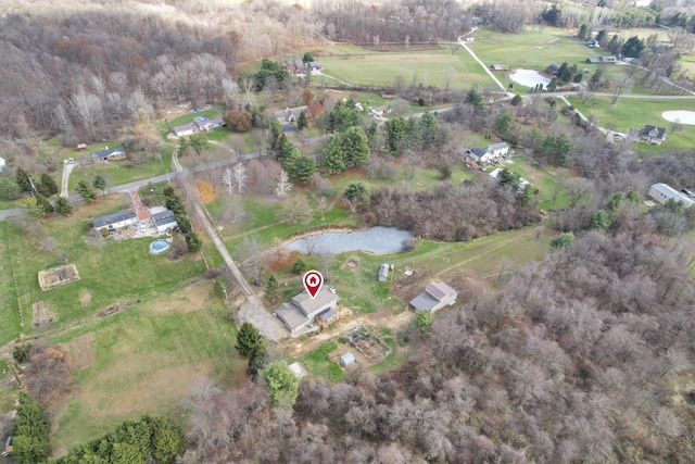 aerial view featuring a rural view and a water view