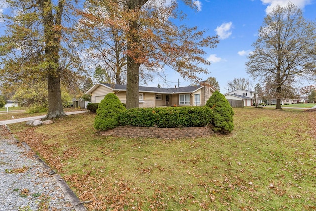 view of front of property with a front lawn