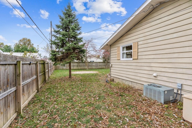 view of yard with central AC unit