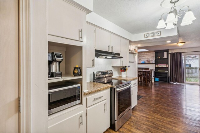 kitchen with decorative light fixtures, dark hardwood / wood-style flooring, stainless steel appliances, and white cabinetry