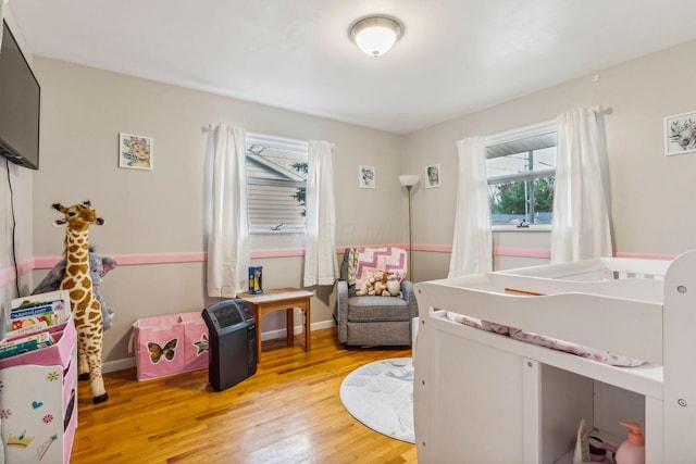 bedroom featuring hardwood / wood-style flooring