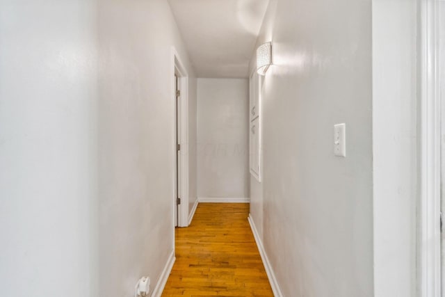 hallway with light wood-type flooring