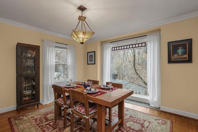 296 Walhalla Rd, Columbus, OH 43202 - dining room with crown molding and wood finished floors