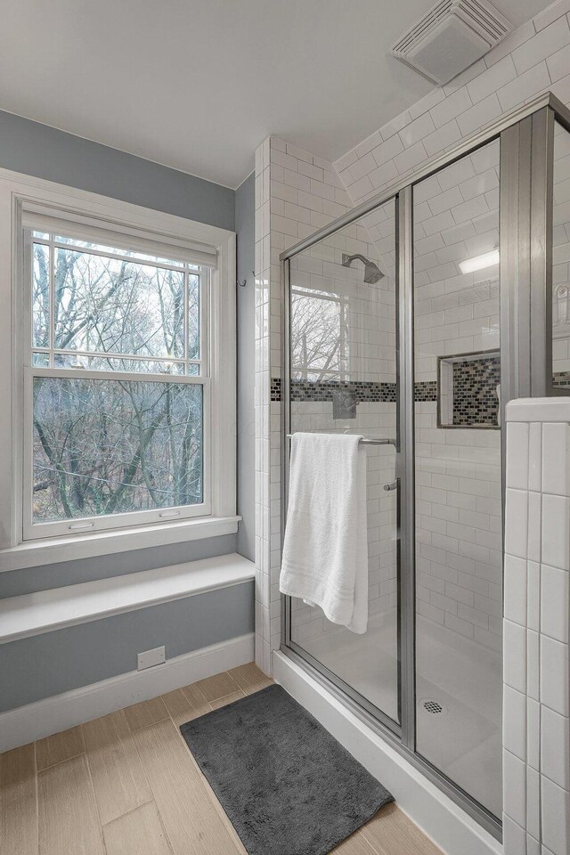 bathroom with an enclosed shower