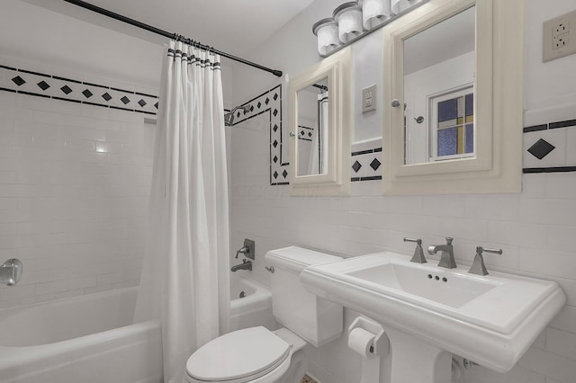 296 Walhalla Rd, Columbus, OH 43202 - full bath with tile walls, shower / tub combo, and decorative backsplash