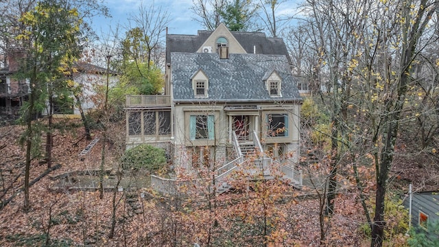 296 Walhalla Rd, Columbus, OH 43202 - view of outdoor structure featuring stairway and a sunroom