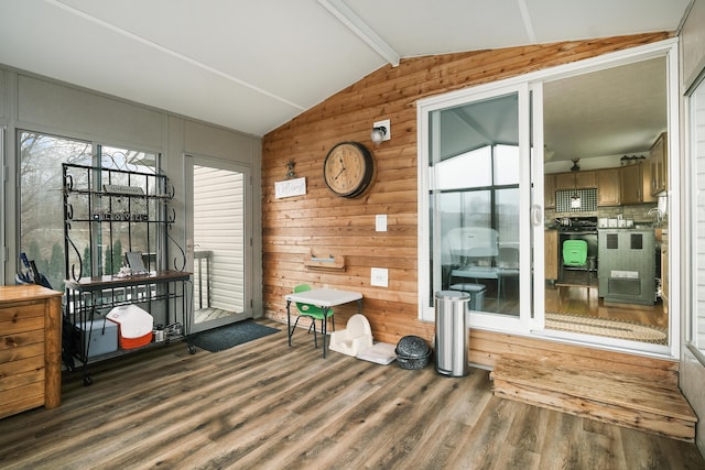 sunroom with vaulted ceiling with beams