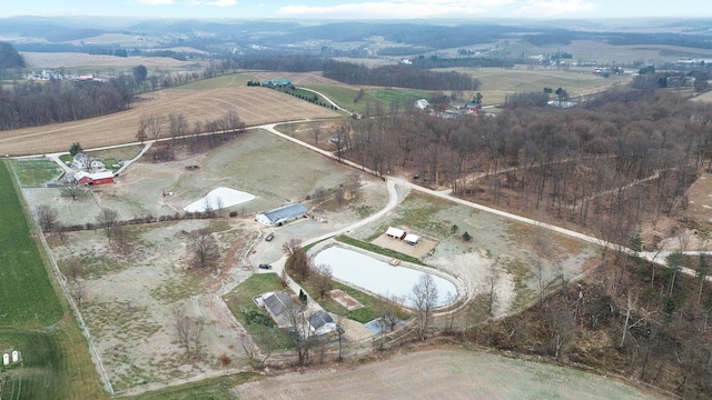 birds eye view of property featuring a rural view