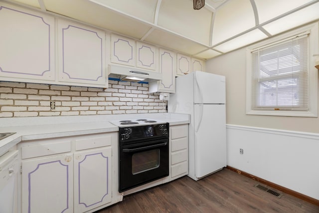 kitchen with white appliances, backsplash, dark hardwood / wood-style flooring, and white cabinetry