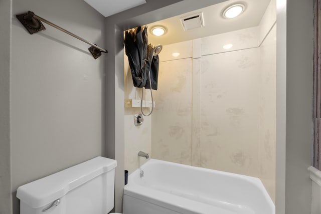 bathroom featuring toilet and shower / bath combination