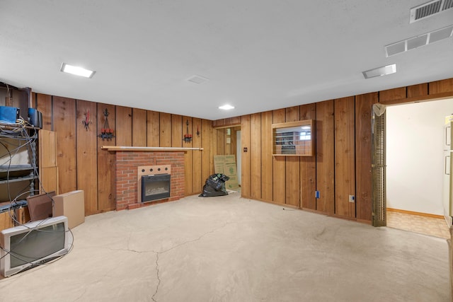 living room featuring a brick fireplace