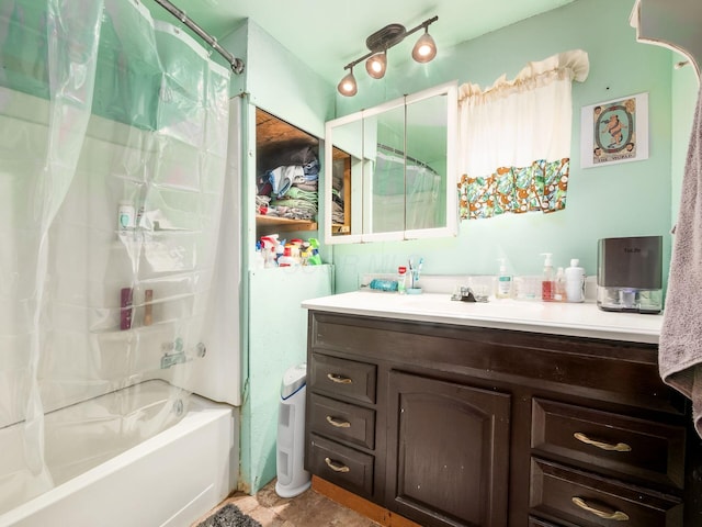 bathroom featuring vanity and shower / bath combo