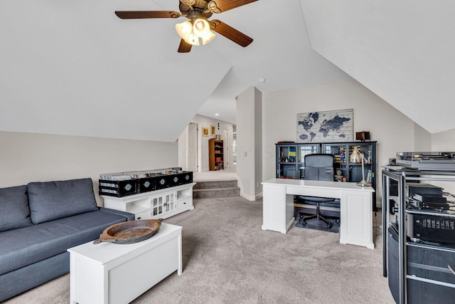 living room with light carpet, vaulted ceiling, and ceiling fan