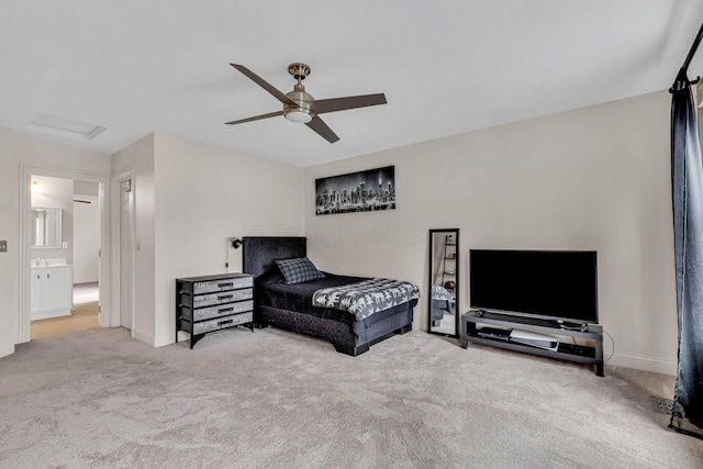 bedroom featuring light colored carpet and ceiling fan