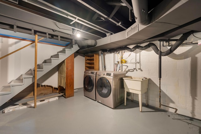 basement featuring washing machine and dryer