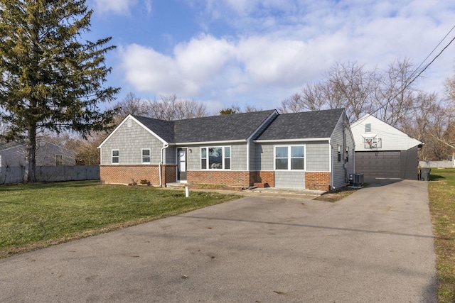 single story home featuring central AC unit and a front yard