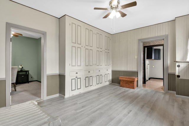 living room with ceiling fan and light hardwood / wood-style floors