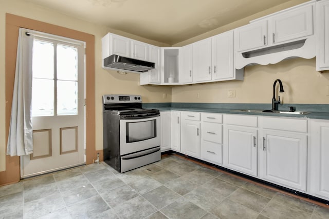 kitchen with white cabinetry, electric range, and sink