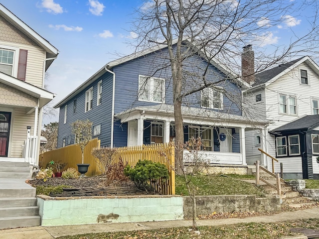 view of property with covered porch