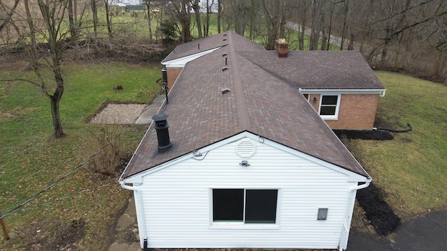 view of property exterior featuring a yard