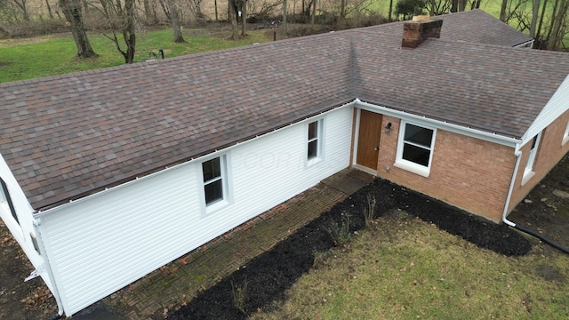 view of home's exterior featuring a lawn