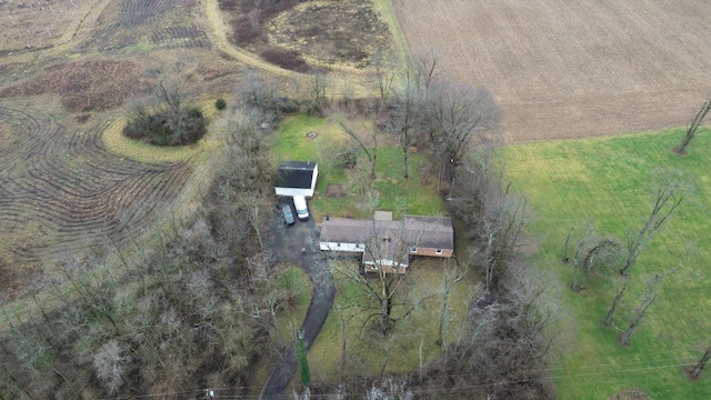 birds eye view of property featuring a rural view