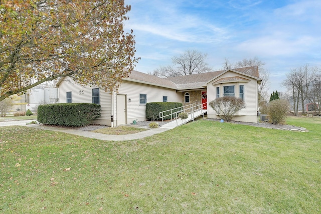 single story home with a front yard